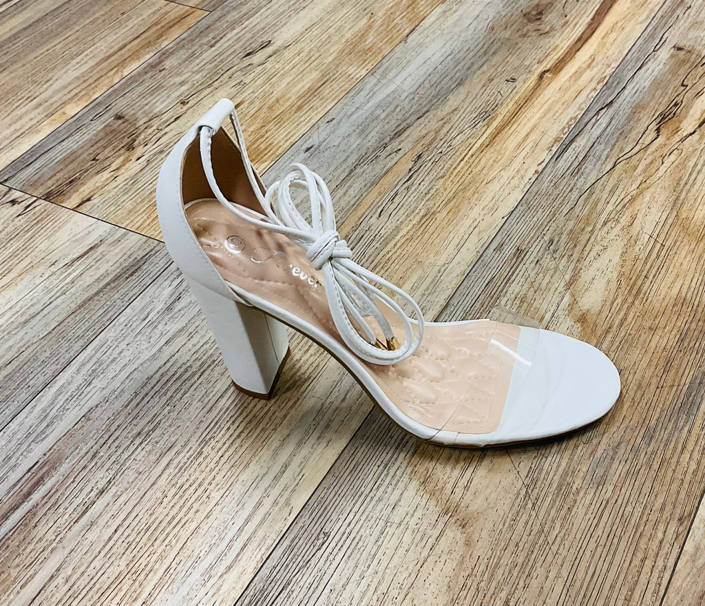 AMBER 12 WHITE PU/CLEAR |HEEL