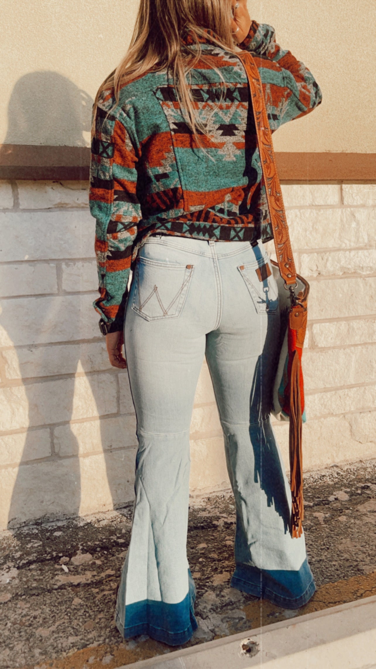 THE WRANGLER RETRO® GREEN JEAN: WOMEN'S HIGH RISE TROUSER IN KATIE